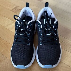 Women’s Black and White Skechers Vapor Foam Sneakers